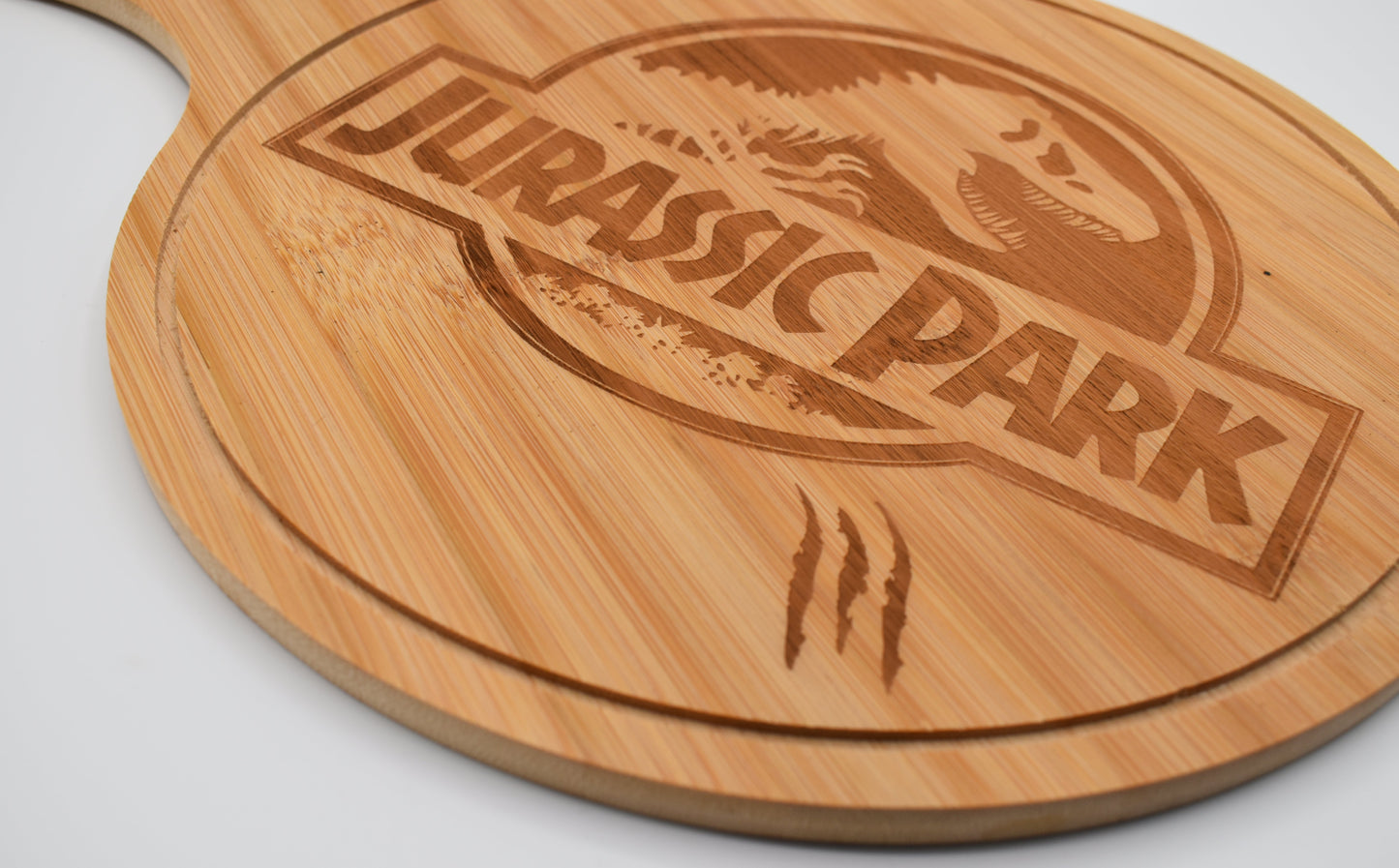 Planche à pizza en bois gravée – Jurassic Park