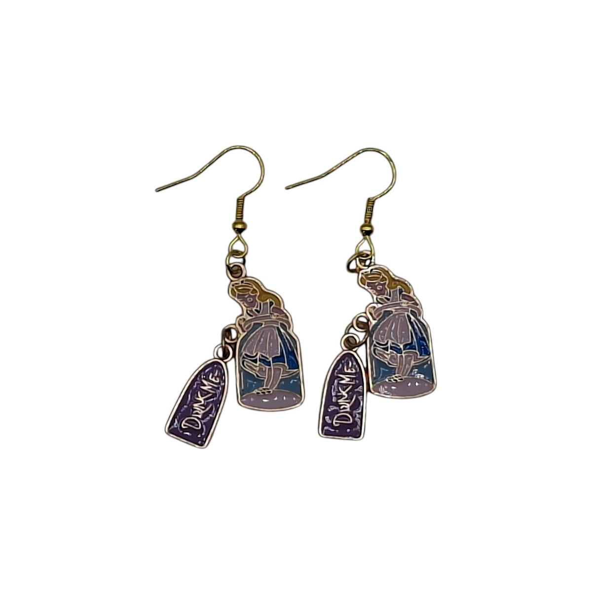 Boucles d’oreilles fiole Drink Me inspirées d’Alice au pays des merveilles sur fond blanc