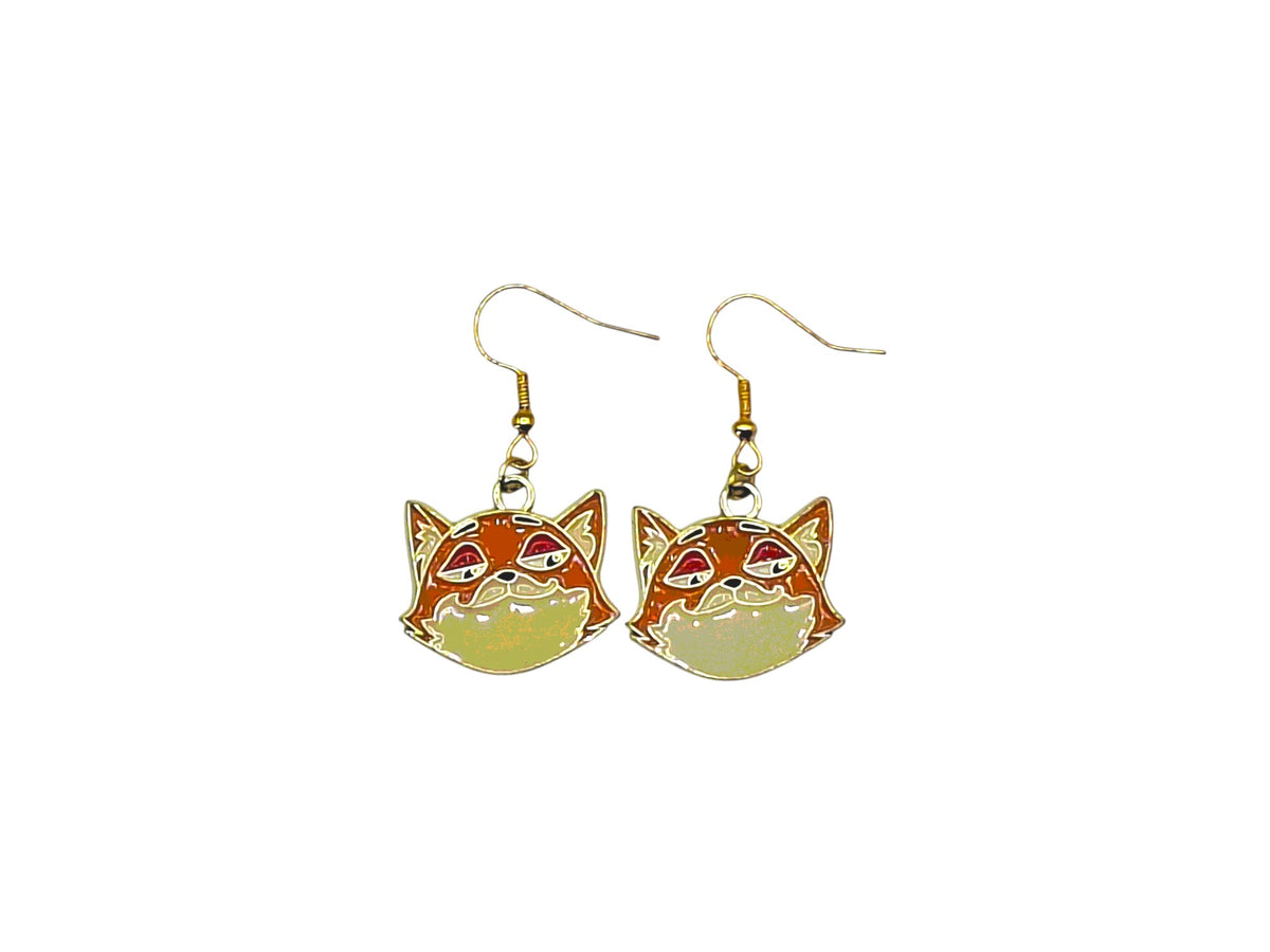 Boucles d’oreilles Nick Wilde renard roux de Zootopie avec crochets dorés sur fond blanc
