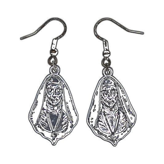 Valak earrings inspired by The Nun, silver-tone nun face pendants with silver-tone hooks on a white background