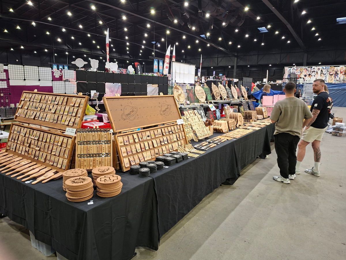 Created convention booth with handcrafted wood and slate engravings