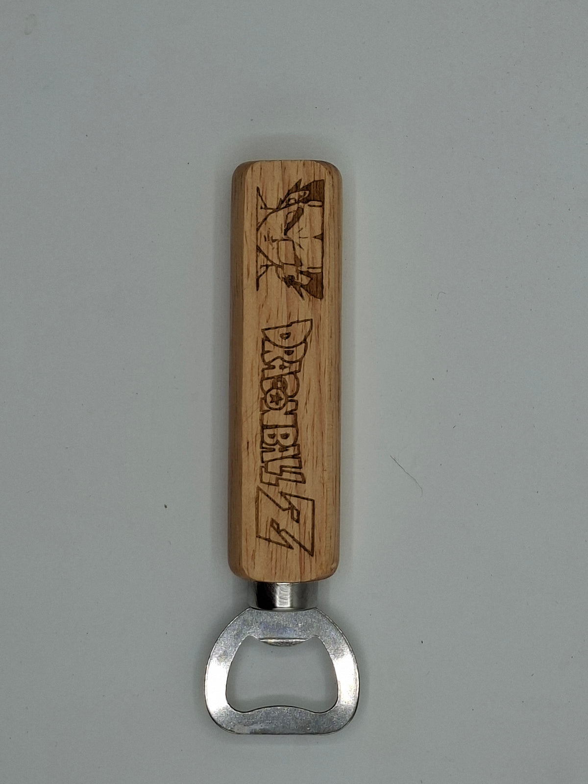 Décapsuleur en bois gravé inspiré de Dragon Ball Z